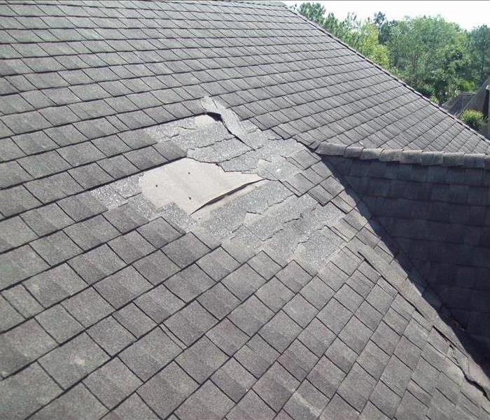 Missing shingles on the roof